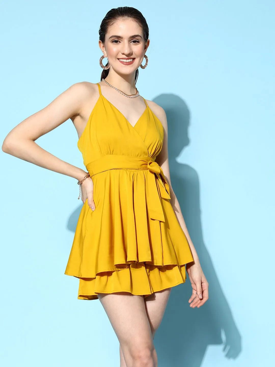 Berrylush Women Solid Yellow V-Neck Waist Tie-Up Backless Layered Mini Playsuit